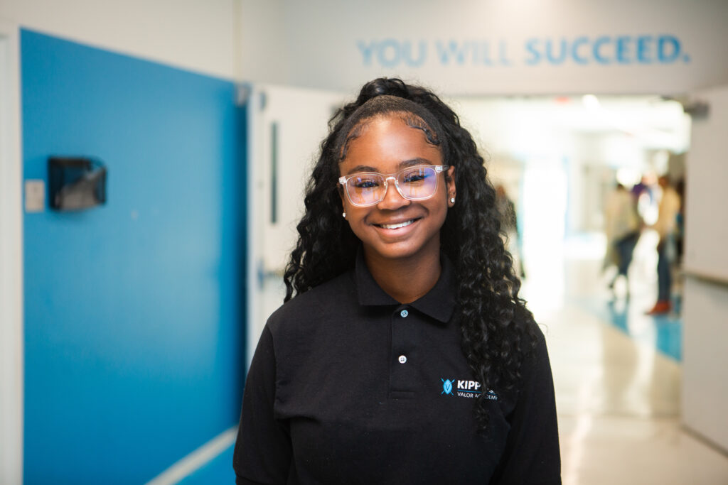 KIPP DC Valor Academy student standing in hallway