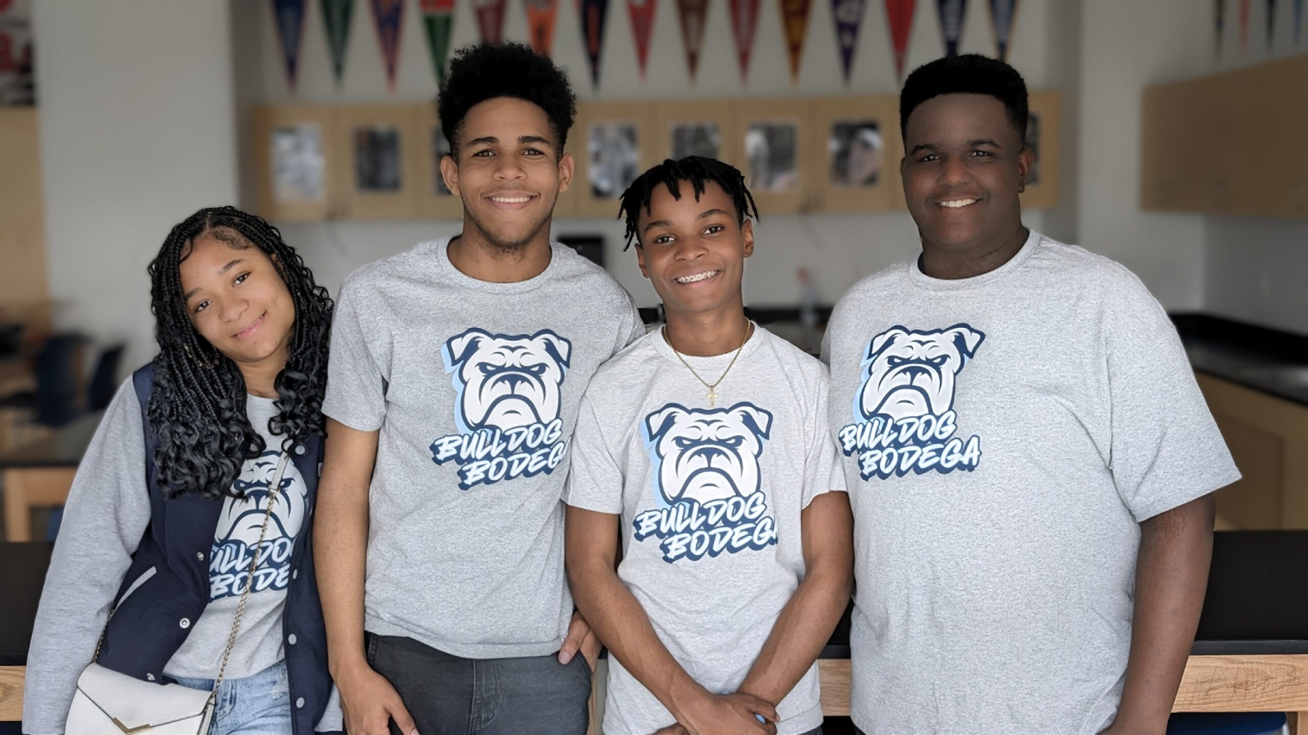 Legacy Students from the Bulldog Bodega post for photo