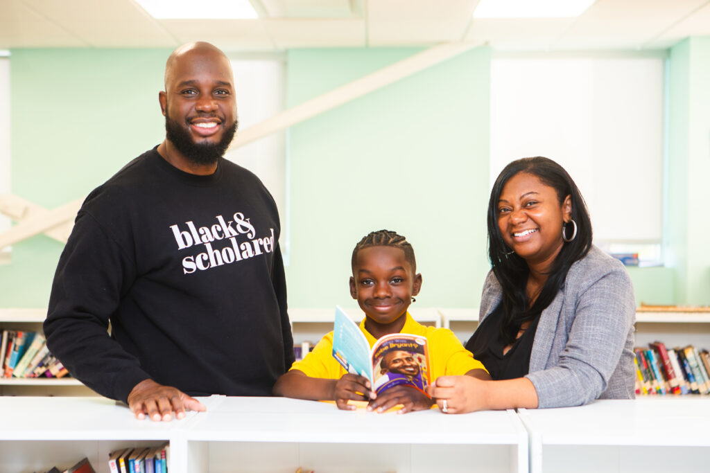 Photo of Solarin Family and Principal Simmons